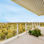 Enchanting balcony with glass railings