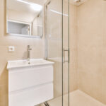 Sink and mirror in modern bathroom